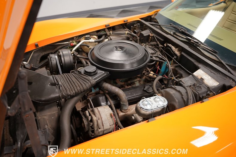 Chevrolet-Corvette-1977-Orange-Metallic-Buckskin-Tan-1