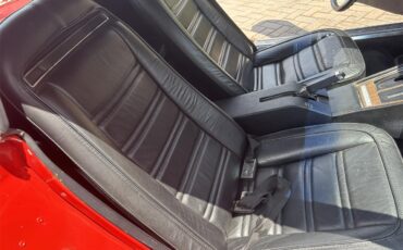 Chevrolet-Corvette-stingray-1972-Mille-Miglia-Red-Black-with-wood-trim-13