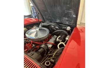 Chevrolet-Corvette-stingray-1972-Mille-Miglia-Red-Black-with-wood-trim-14