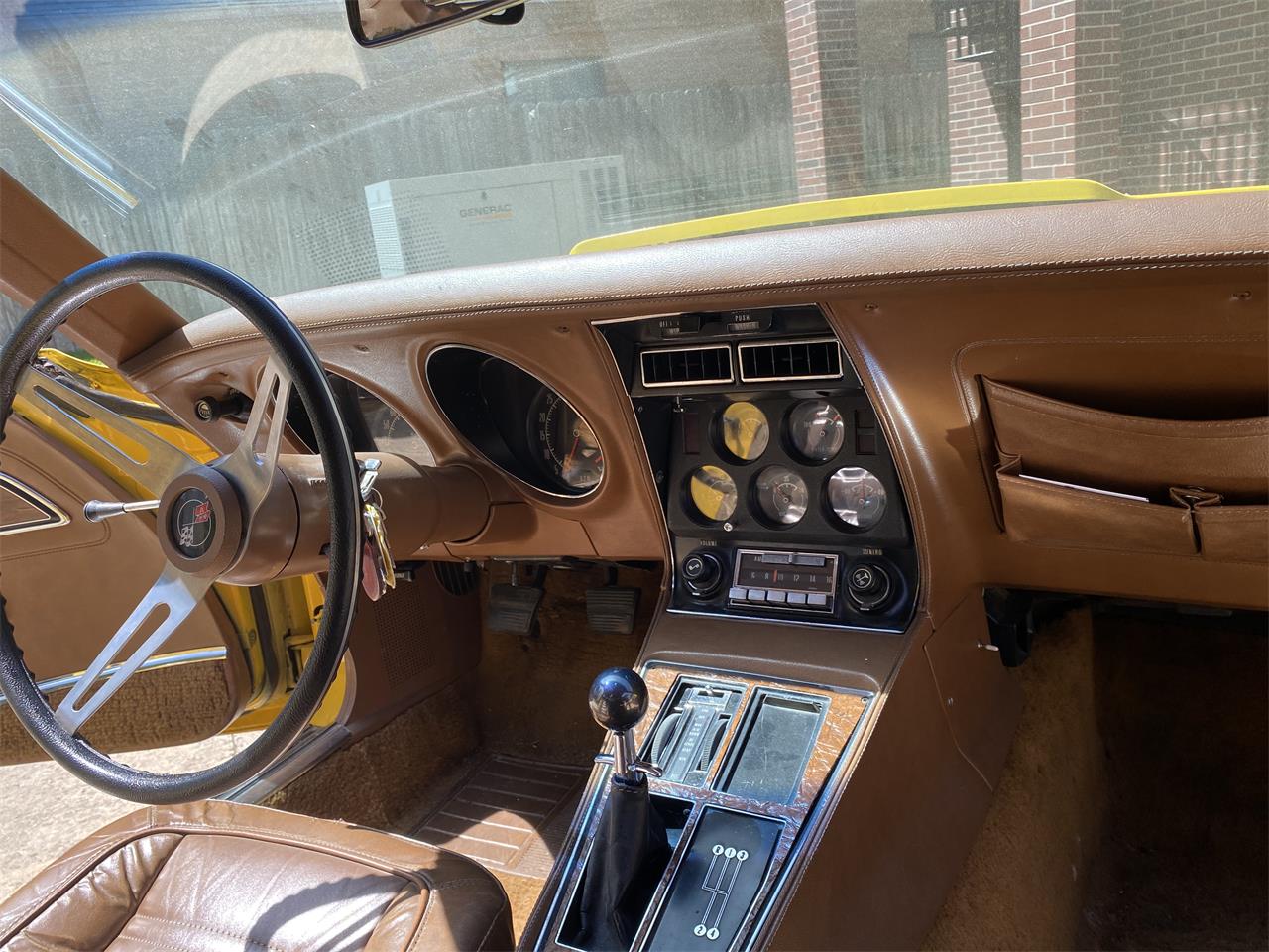 Chevrolet-Corvette-stingray-1973-Yellow-Dark-Saddle-Leather-15