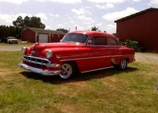 Chevrolet-Delray-1954-Red-Cream-Saddle