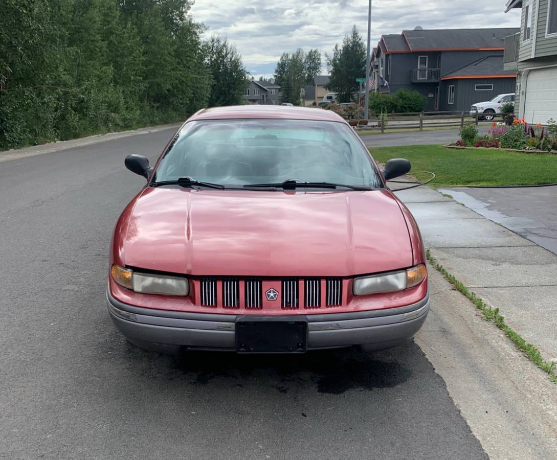 Cord-E-limited-sedan-1993-red-1
