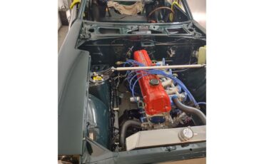 Datsun-240z-1973-Green-Orangeblack-42