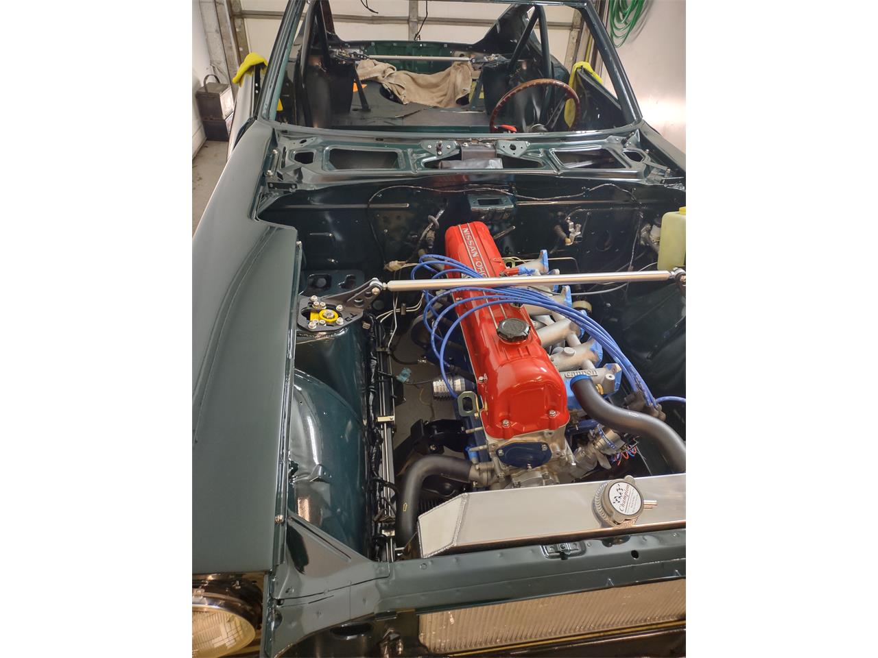 Datsun-240z-1973-Green-Orangeblack-42