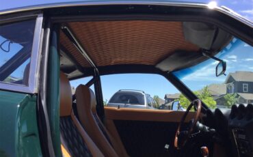 Datsun-240z-1973-Green-Orangeblack-57