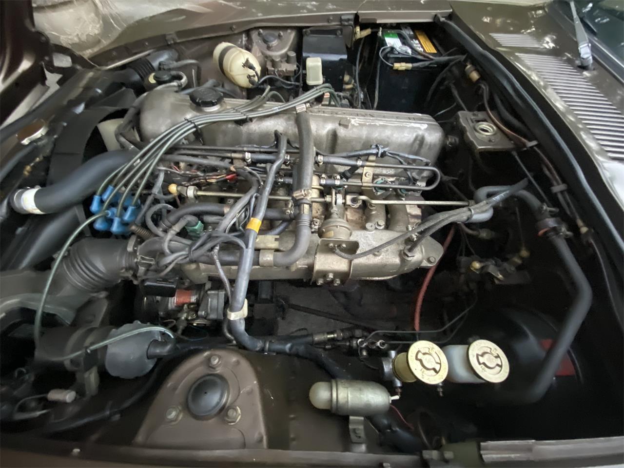 Datsun-280z-1975-Brown-Tope-Black-10