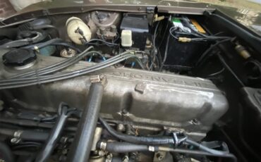 Datsun-280z-1975-Brown-Tope-Black-11