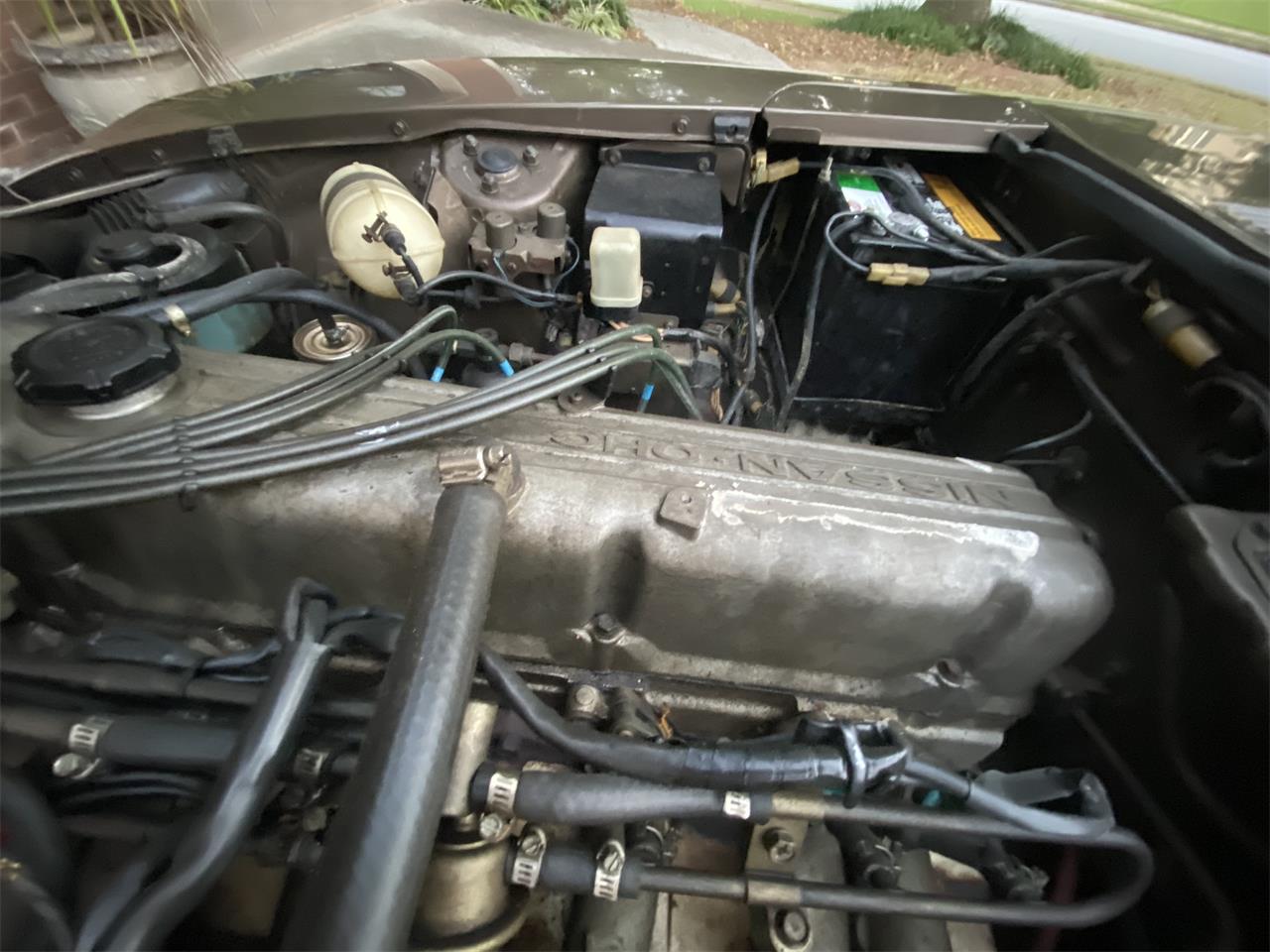 Datsun-280z-1975-Brown-Tope-Black-11