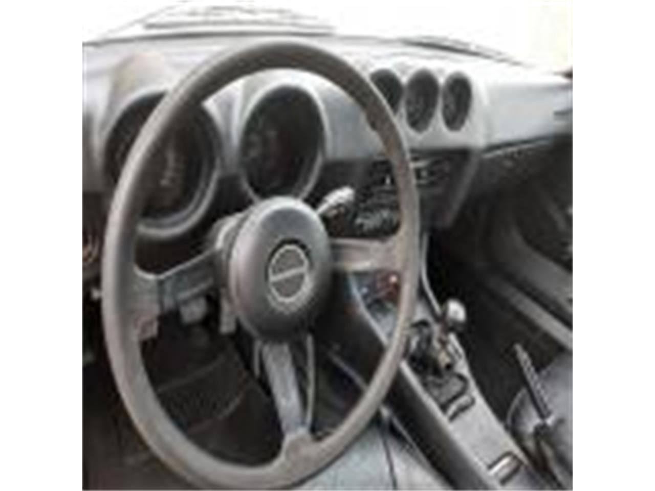 Datsun-280z-1975-Brown-Tope-Black-7