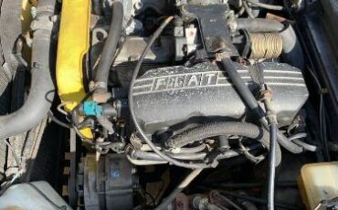 Fiat-124-spider-1980-Black-Saddle-Tan-6