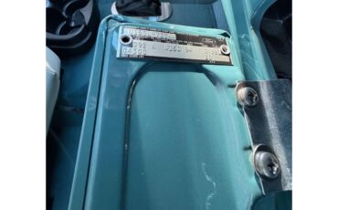 Ford-Bronco-1973-Teal-Parchment-White-17