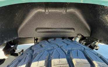 Ford-Bronco-1973-Teal-Parchment-White-31