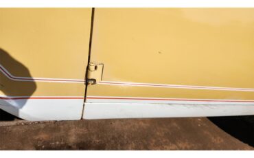 Ford-Bronco-1974-yellow-and-white-brown-17