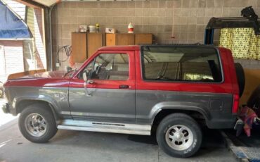 Ford-Bronco-1986-Silver-Red
