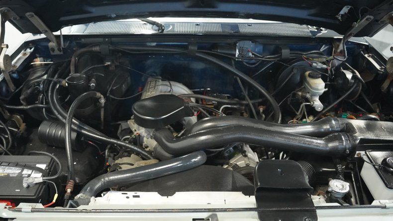 Ford-Bronco-1990-Dark-Shadow-Blue-Met-Tan-Mocha