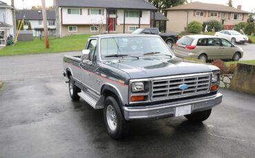 Ford-F250-lariat-1985-SilverCharcoal-Red