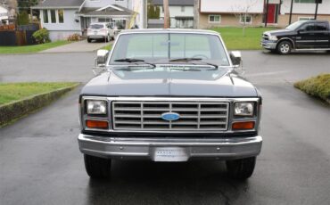 Ford-F250-lariat-1985-SilverCharcoal-Red-7