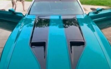 Ford-Mustang-1973-Turquoise-Black-4