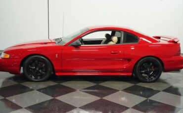 Ford-Mustang-1994-Rio-Red-Saddle