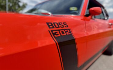 Ford-Mustang-boss-302-1970-Calypso-Coral-Black-22