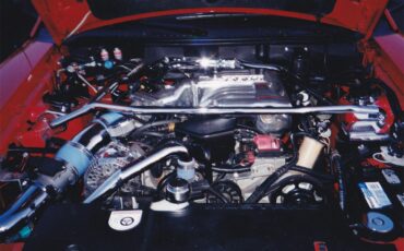 Ford-Mustang-cobra-1994-Rio-Red-Saddle-Black-18