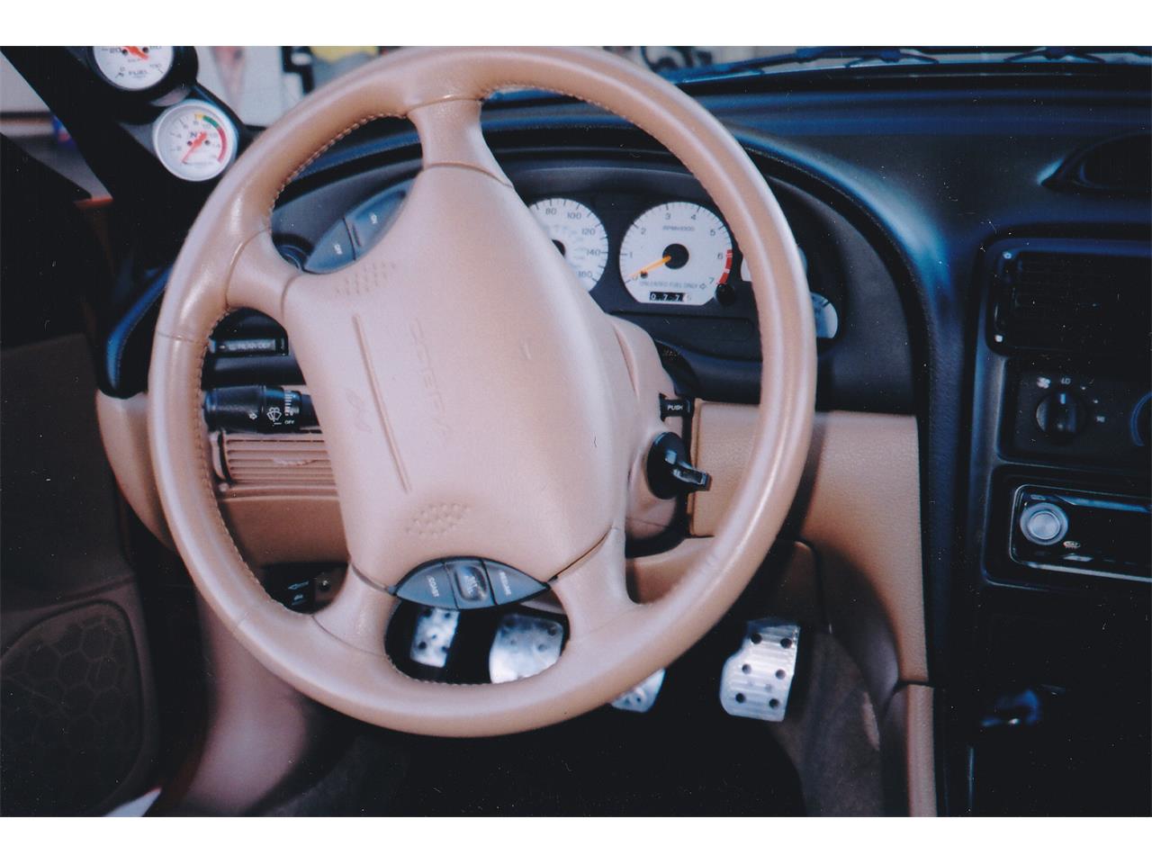 Ford-Mustang-cobra-1994-Rio-Red-Saddle-Black-32