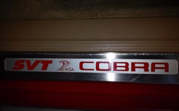 Ford-Mustang-cobra-1994-Rio-Red-Saddle-Black-36