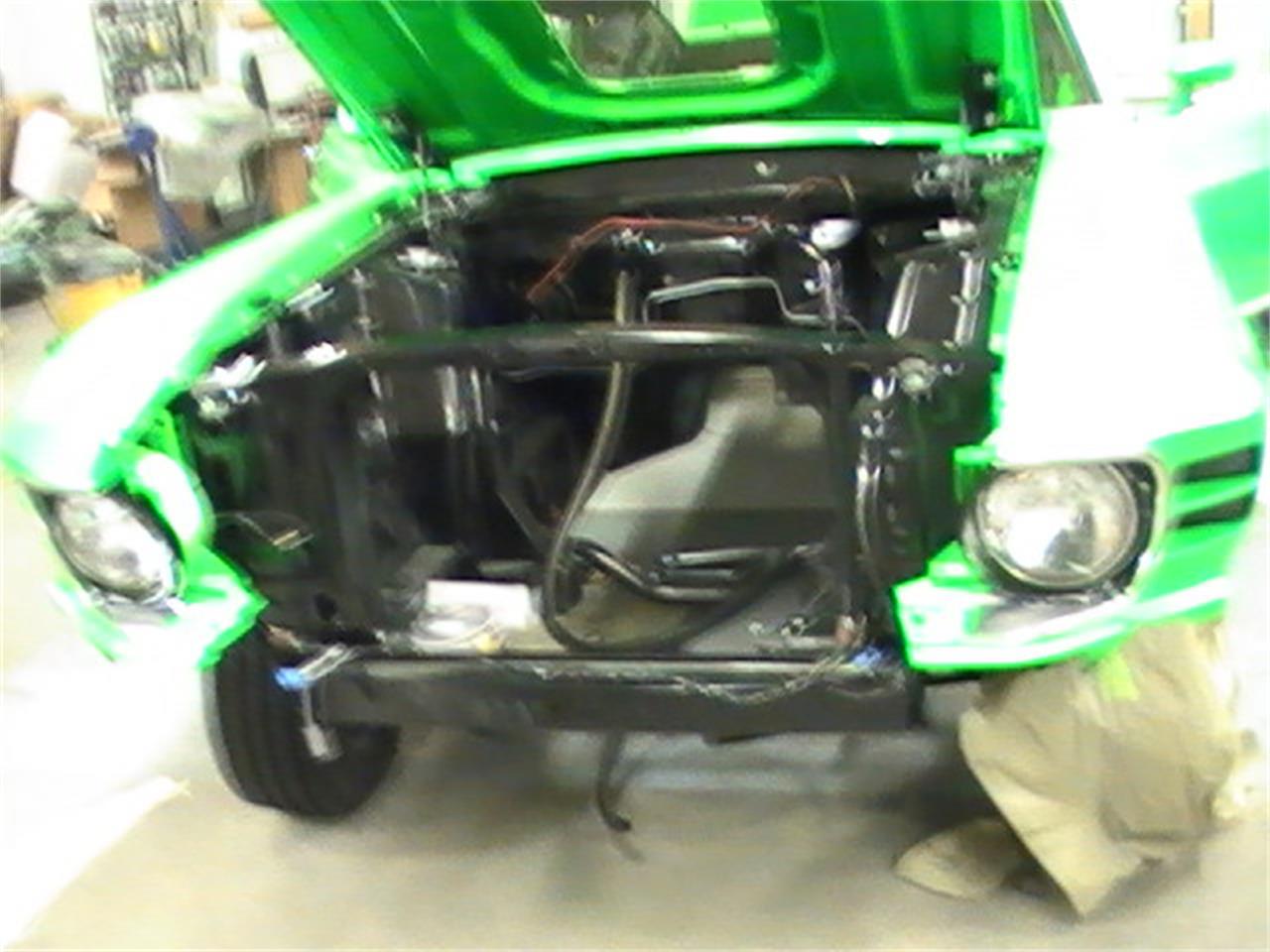 Ford-Mustang-mach-1-1970-GreenGloGreen-Black-14