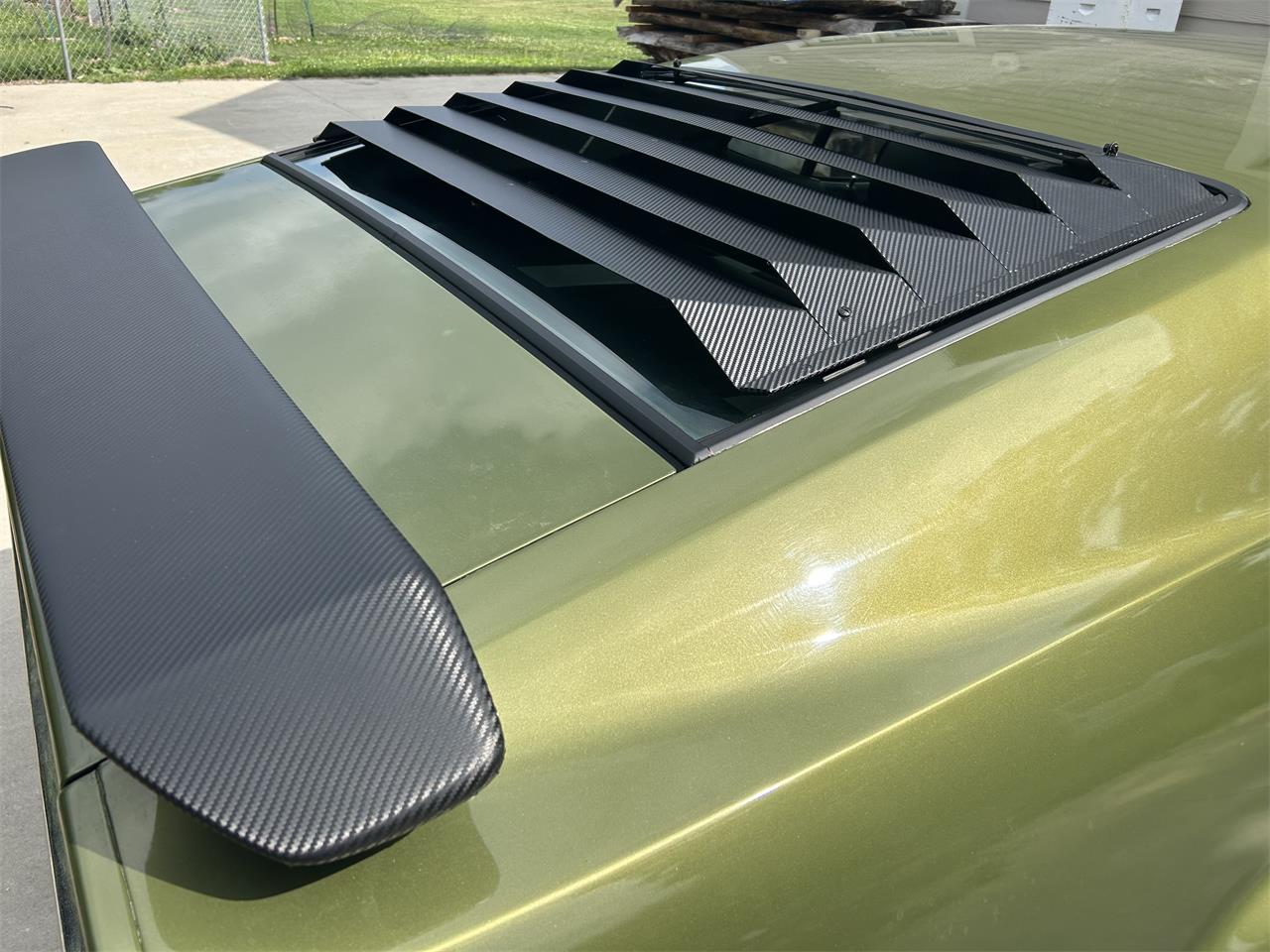 Ford-Mustang-mach-1-1973-Ivy-glow-metalic-Black-62