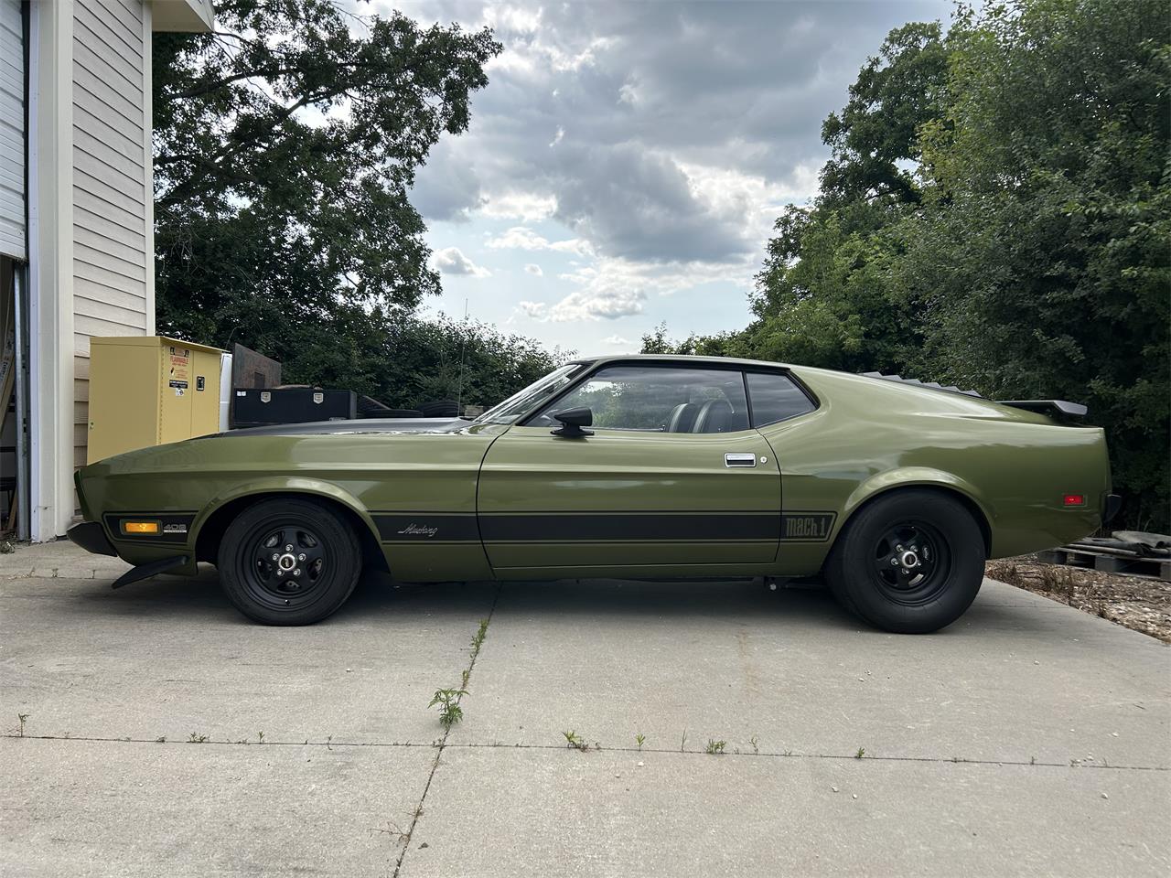 Ford-Mustang-mach-1-1973-Ivy-glow-metalic-Black
