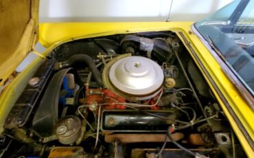Ford-Thunderbird-1956-YellowBlack-Top-Black-17