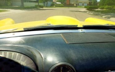 Ford-Thunderbird-1956-YellowBlack-Top-Black-6