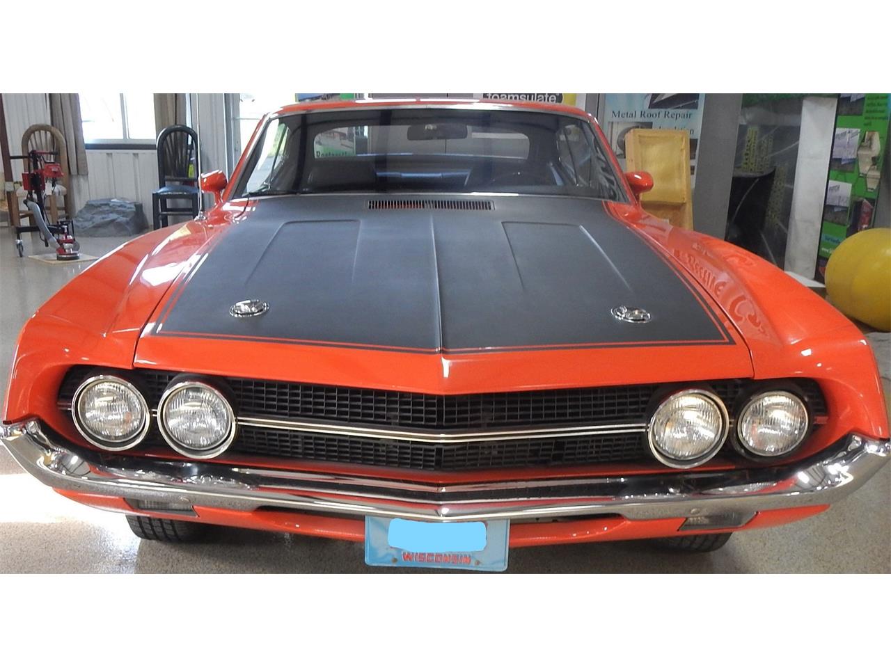 Ford-Torino-1970-Calypso-Coral-Black-4