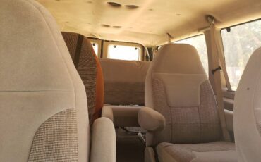 Ford-e150-club-wagon-1992-brown-1