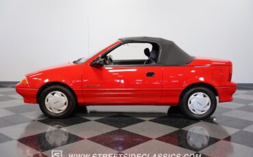 Geo-Metro-1991-Red-Gray-25