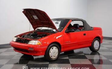 Geo-Metro-1991-Red-Gray-8