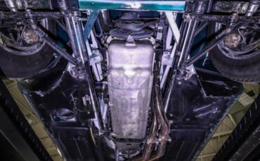 Jaguar-E-type-1964-Green-Tan-37