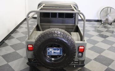 Jeep-Cj8-scrambler-1985-Gray-Black-31