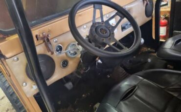 Jeep-Ster-1957-Tan-Black-3