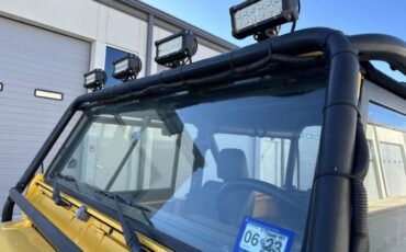 Land-rover-Defender-1994-YellowBlack-Top-Black-1