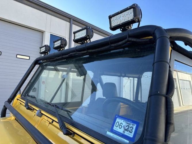 Land-rover-Defender-1994-YellowBlack-Top-Black-1