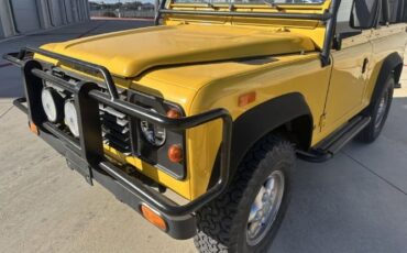 Land-rover-Defender-1994-YellowBlack-Top-Black-11