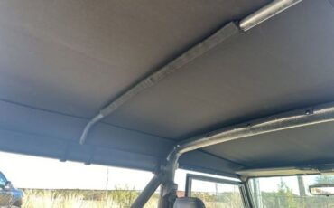 Land-rover-Defender-1994-YellowBlack-Top-Black-13