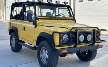 Land-rover-Defender-1994-YellowBlack-Top-Black-17