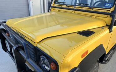 Land-rover-Defender-1994-YellowBlack-Top-Black-2