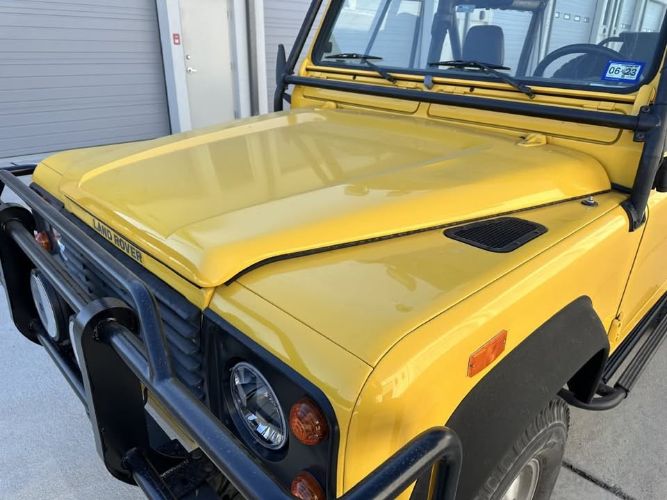 Land-rover-Defender-1994-YellowBlack-Top-Black-2