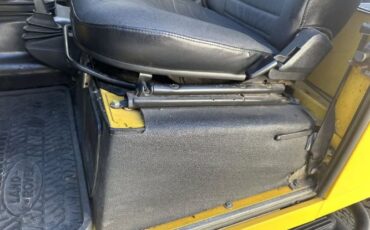 Land-rover-Defender-1994-YellowBlack-Top-Black