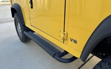 Land-rover-Defender-1994-YellowBlack-Top-Black-4