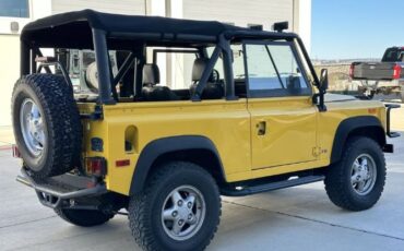 Land-rover-Defender-1994-YellowBlack-Top-Black-5