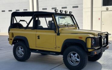Land-rover-Defender-1994-YellowBlack-Top-Black-7
